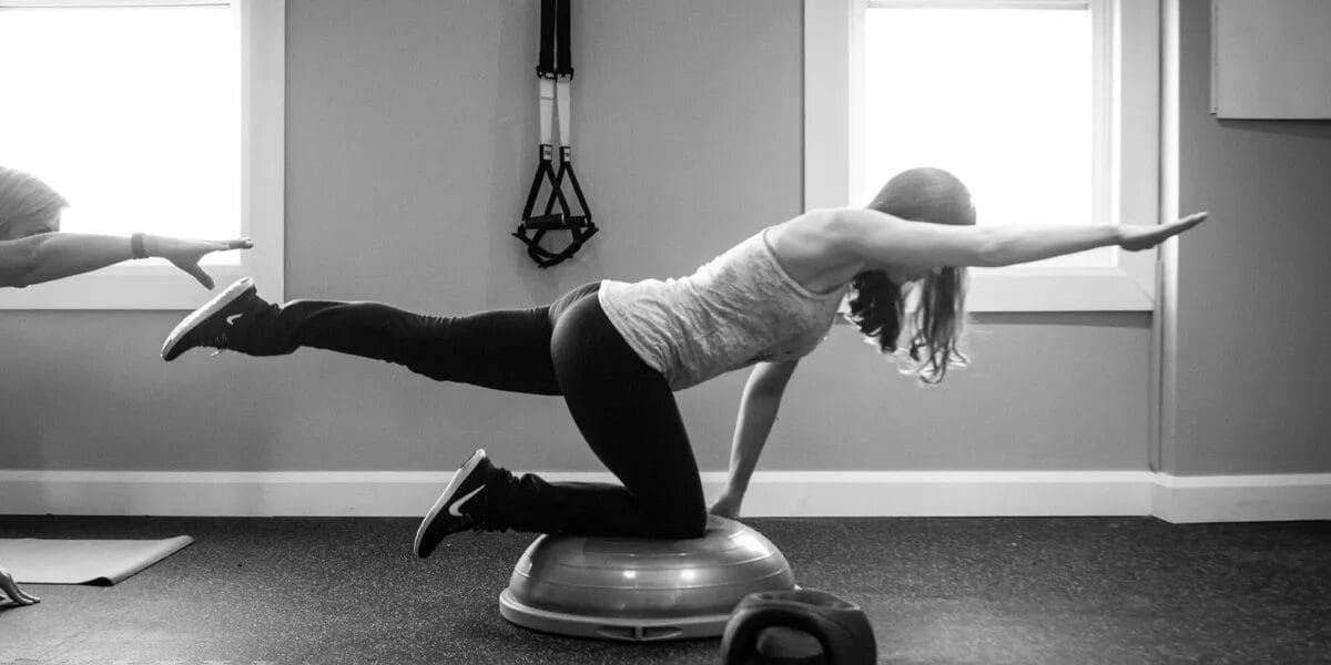 Woman doing Yoga on a exercise ball