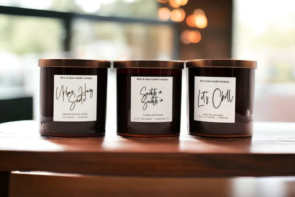Three candles from Wick and Glow Candle Company